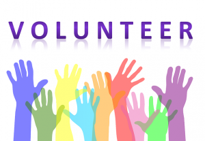 Multicolored raised hands "Volunteer"